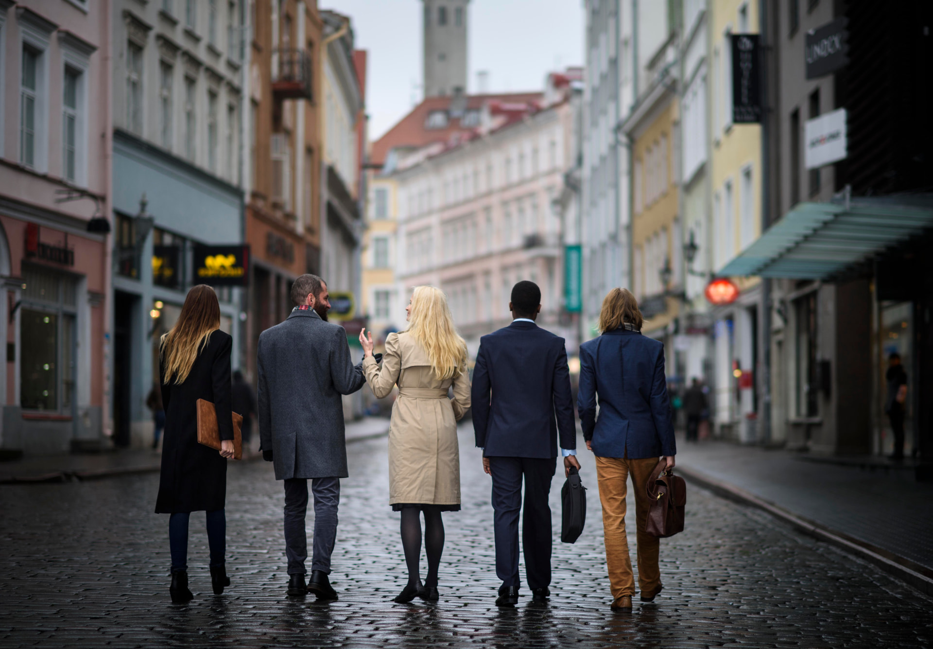 Professionals walking through Tallinn's Old Town